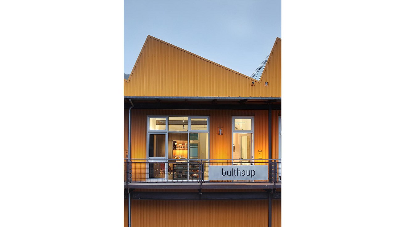 Exterior view of bulthaup Aspen showcasing the architecture of the angled roofline