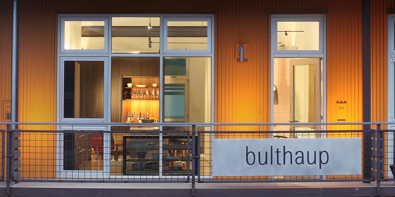 Exterior of the bulthaup Aspen showroom located in the Roaring Forks Valley, Basalt Colorado. A bright yellow exterior.